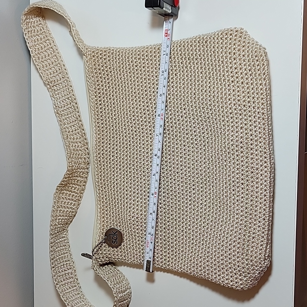 The Sak cream colored crochet purse.